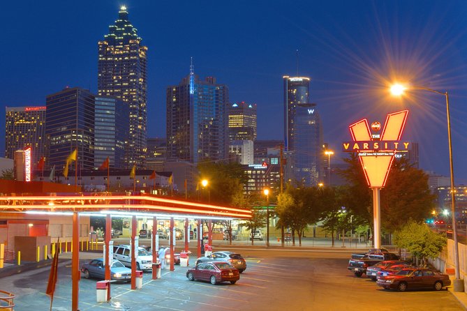 City Lights Atlanta Night-Time Tour with Photos & Dinner Stop - Downtown, the stadium district, and Centennial Olympic Park