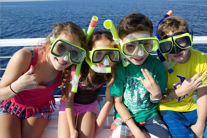 Deluxe Snorkel & Dolphin Watch Aboard a Luxury Catamaran from Kailua-Kona - A Kona morning that mixes wildlife and water play