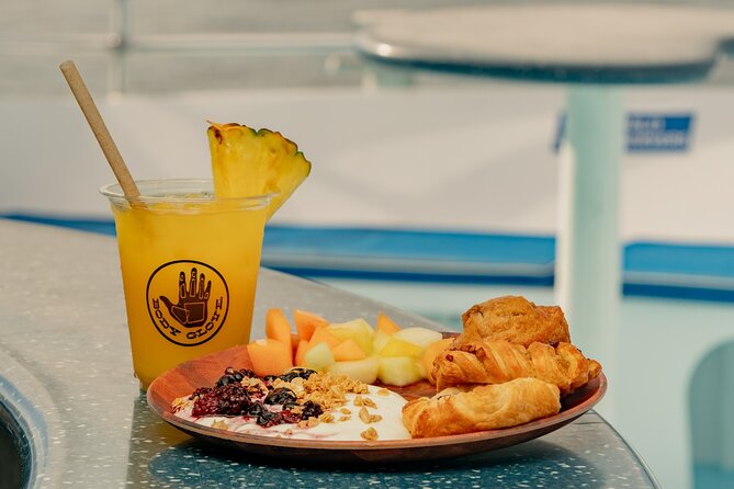 Deluxe Snorkel & Dolphin Watch Aboard a Luxury Catamaran from Kailua-Kona - Who gets the best value for $183.77?