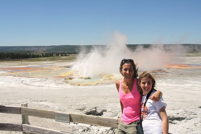 From Jackson Hole: Yellowstone Old Faithful, Waterfalls and Wildlife Day Tour - Geyser basins, steam, and mud at Fountain Paint Pot