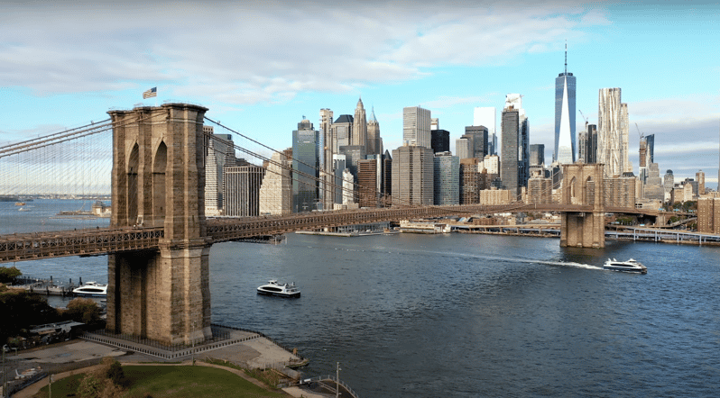 From Manhattan: 5-Hour Bronx, Queens, and Brooklyn Bus Tour - The guide is central to the experience