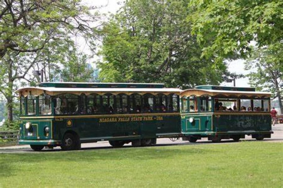 From NYC: Guided Niagara Falls Full-Day Trip - Cave of the Winds brings you closest to the water