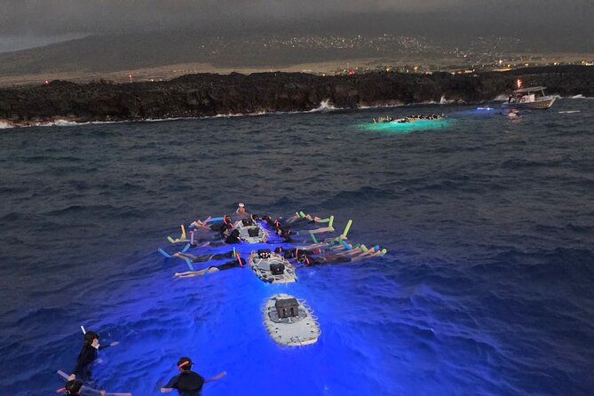 Glow of the Deep: Night Snorkeling with Manta Rays - Watching the manta ballet below you