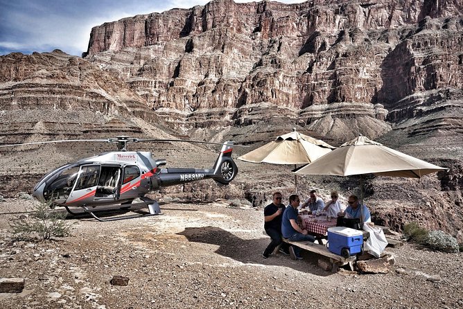 Grand Canyon Deluxe Helicopter Tour with Landing from Las Vegas - Leaving Las Vegas over Lake Mead