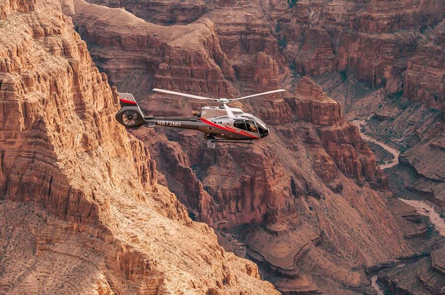 Grand Canyon West: West Rim Helicopter Tour with Landing - Descending below the rim to the landing site