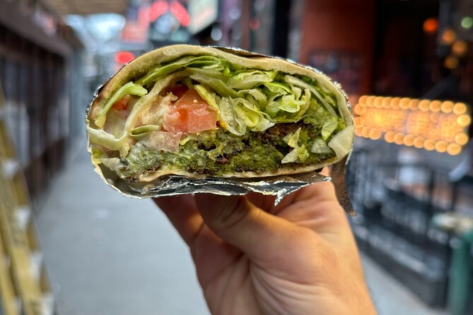 Greenwich Village Walking and Food Tasting Tour - Faicco’s arancini and sopressata