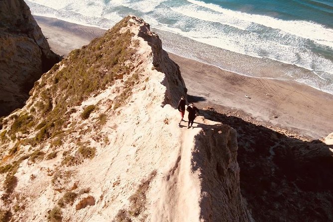 Incredible Slot Canyons to the Pacific - Sandstone passages, wind caves, and the waterfall grotto