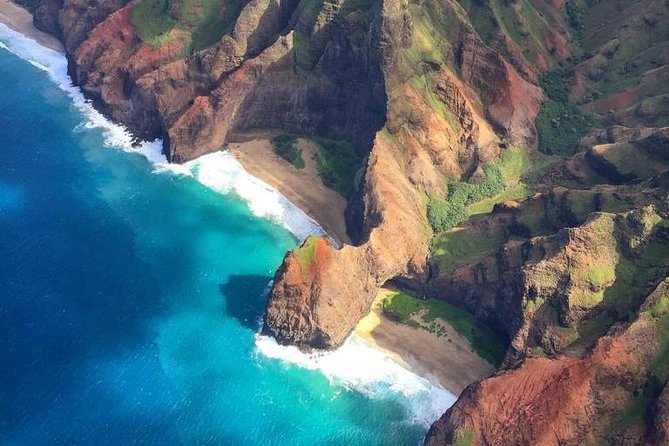 Kauai Deluxe Sightseeing Flight - First views: Kipu Kai and the Poipu shoreline