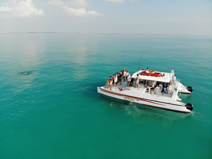 Key West: Dolphin Watching and Snorkeling Sunset Cruise - What the snorkeling stop feels like in practice