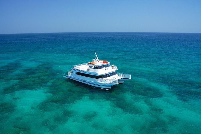 Key West Glass-Bottom Boat Tour with Sunset Option - The ride from Duval Street to Western Dry Rocks
