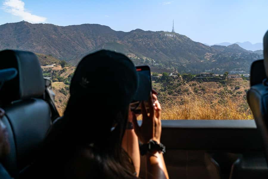 Los Angeles: Celebrity Homes and Hollywood Open-Air Bus Tour - Climbing into the Hollywood Hills