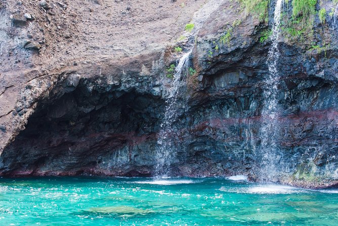 Na Pali Coast Half-Day Raft and Snorkel Adventure - Sea caves, waterfalls, and the cost of rough water