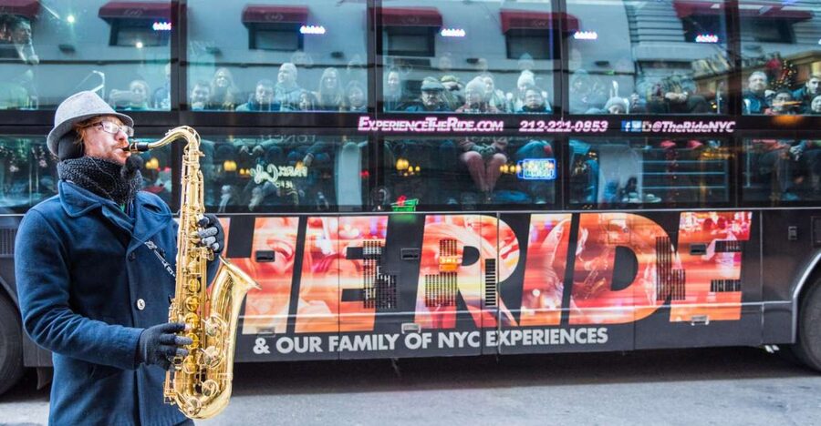 New York City: The Ride Interactive Bus Tour - Street performers become part of the show