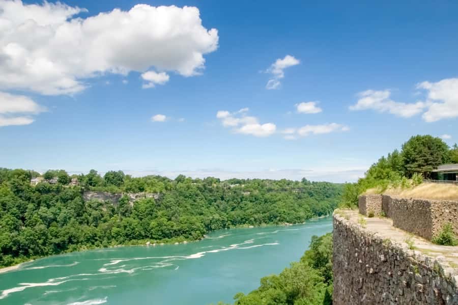 Niagara Falls: Canadian and American Deluxe Day Tour - The Canadian side shows the sweep of Horseshoe Falls
