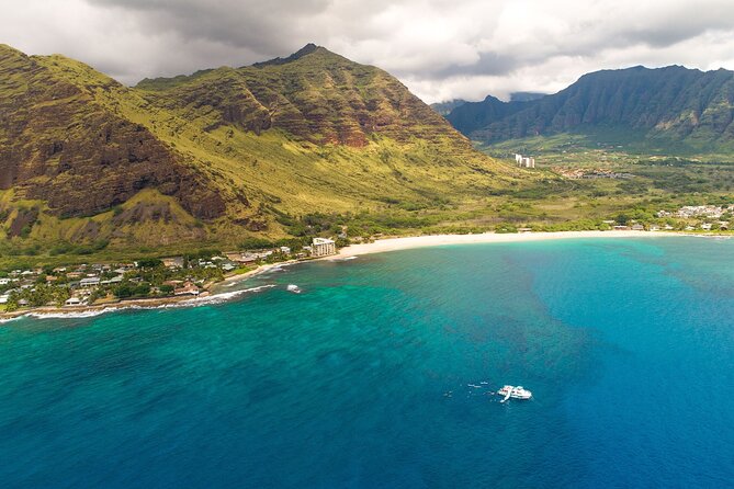 Oahu Dolphin and Snorkel Tour with Waikiki Pickup & Lunch - The slide and water toys keep the boat lively