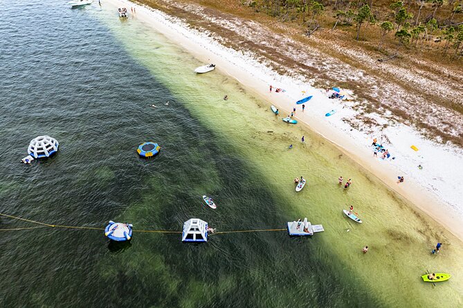 Shell Island Inflatable Adventure Park & Dolphin Sightseeing Tour - Finding a comfortable spot on the boat