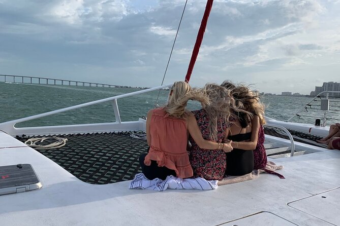 Sunset Catamaran Cruise in Ft. Lauderdale - Open water, raised sails, and the sunset