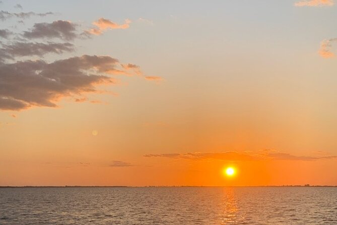 Sunset Dolphin Cruise with Sanibel Lighthouse Views - Captains who add local stories and humor