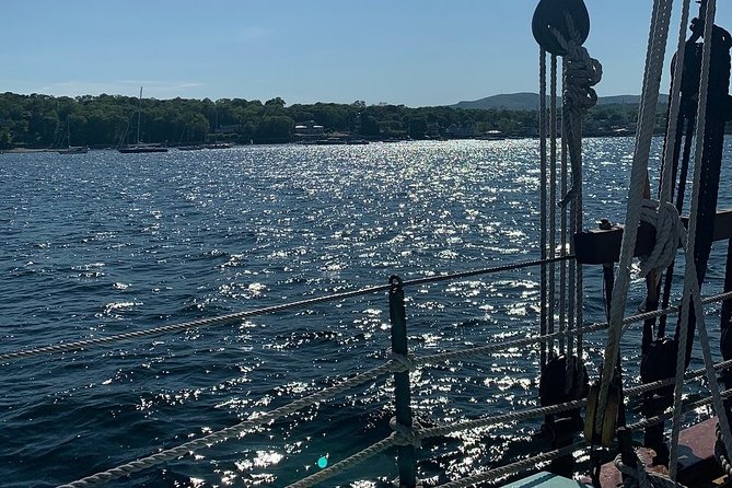 Windjammer Classic Day Sail from Camden, Maine - Helping raise the sails and taking the wheel